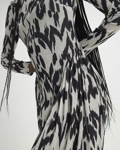 Cream Animal Print Long Sleeve Maxi Dress