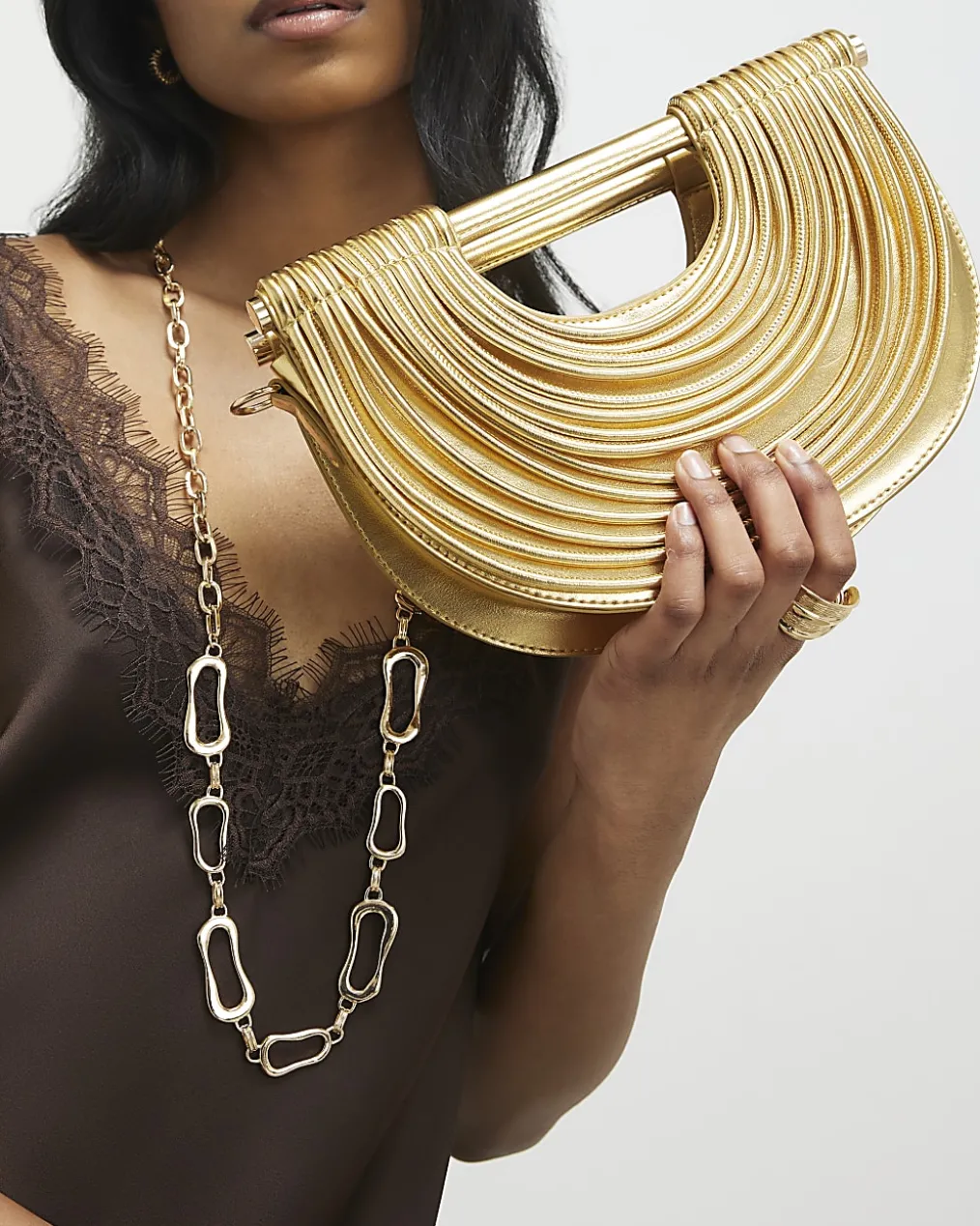 Gold Tube Clutch Bag